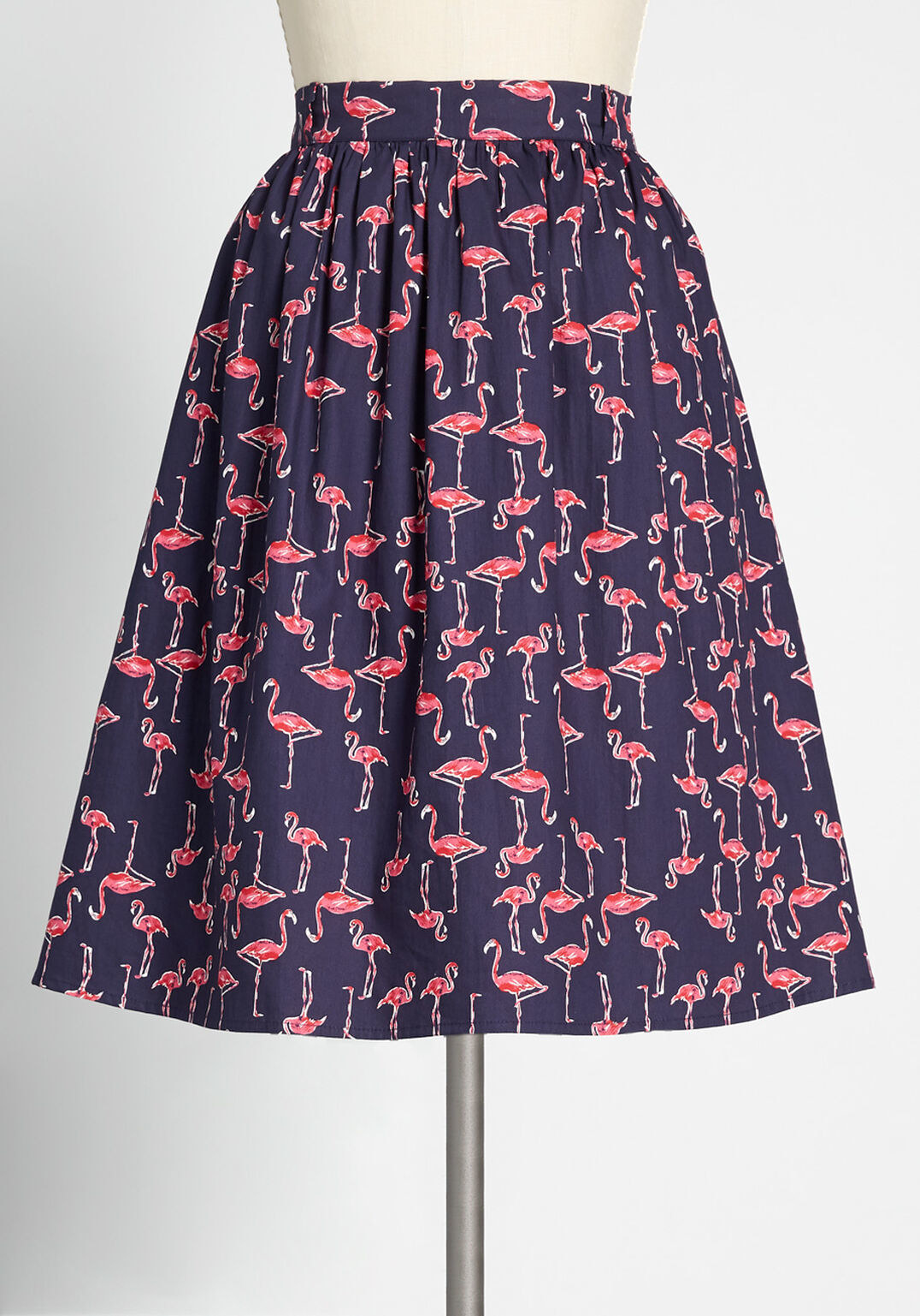 a navy blue skirt with an all-over flamingo patter