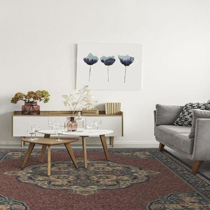 Elegant white, grey and blue living room interior with scandinavian sofa and velvet armchair