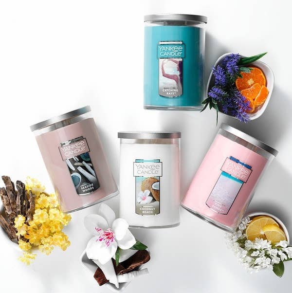 Cuatro velas Yankee en su estilo de vaso y en cuatro aromas diferentes