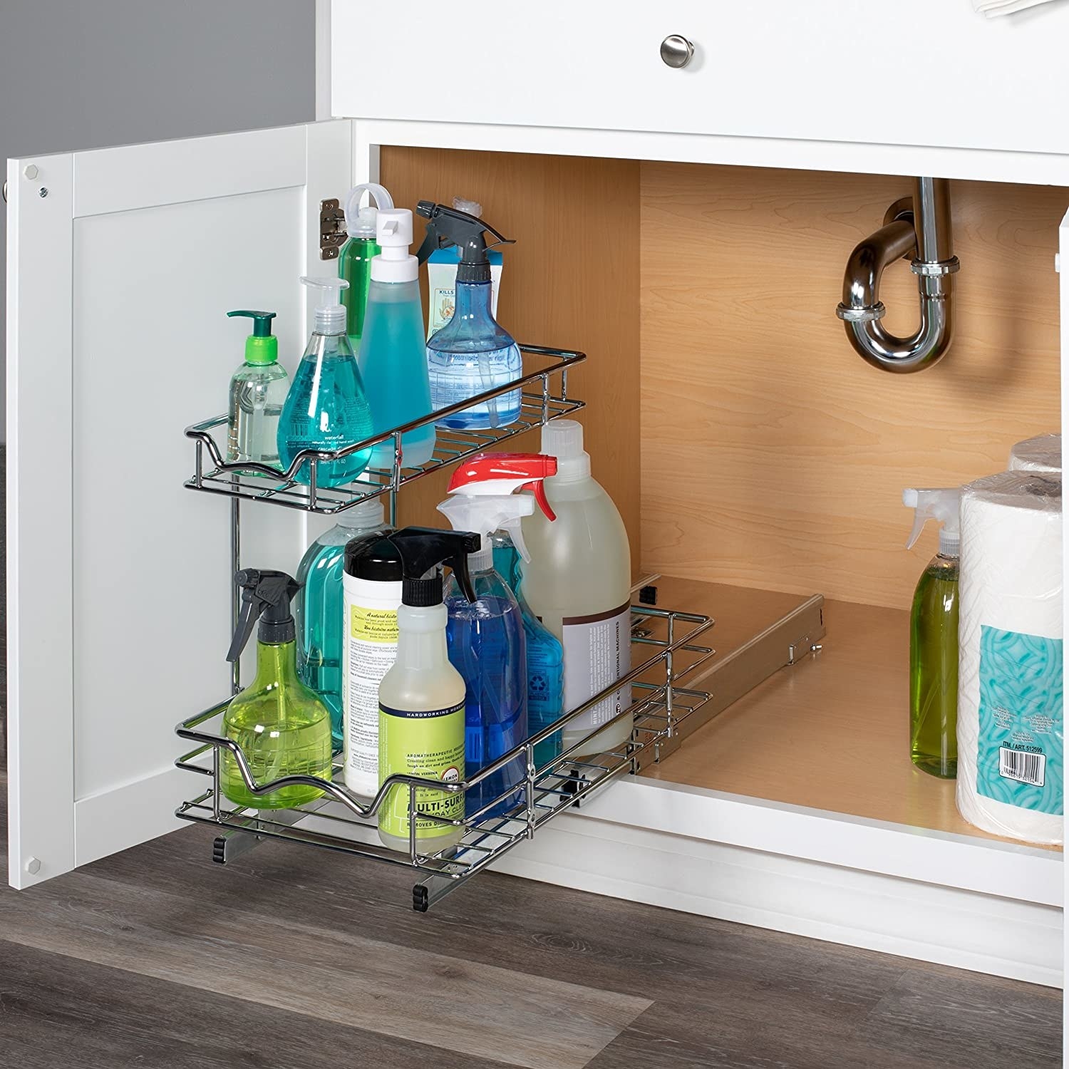 The cabinet organizer filled with cleaning supplies, pulled out from its stand 