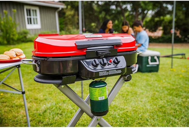 the portable propane grill in red