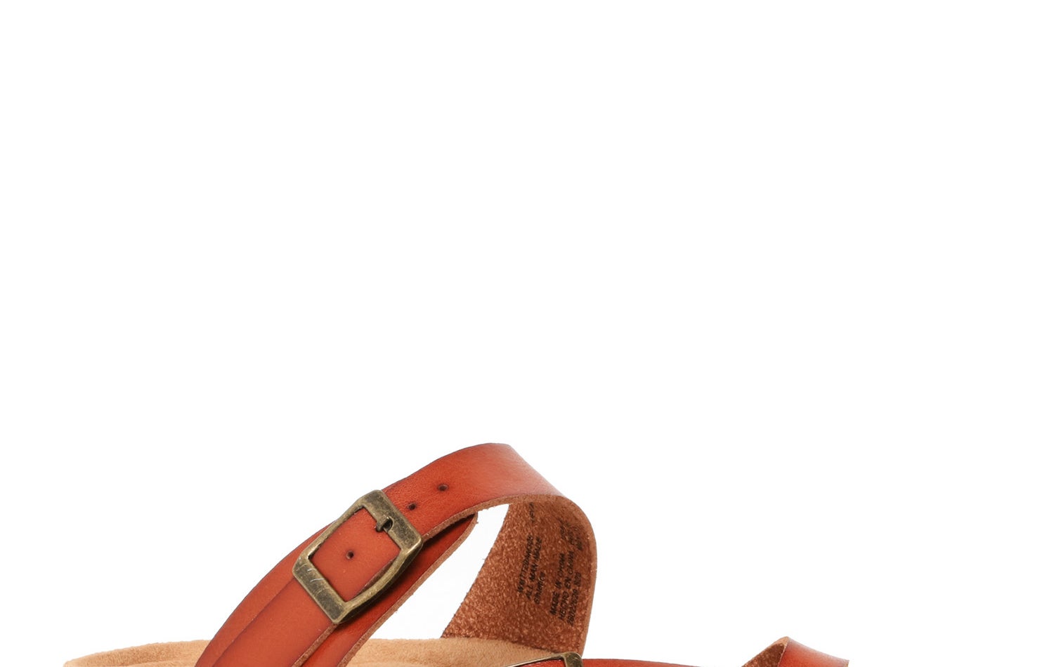 The sandal with burnt orange straps and a cork sole