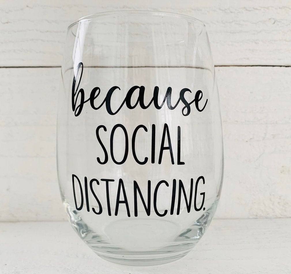 The wine glass with black print letters