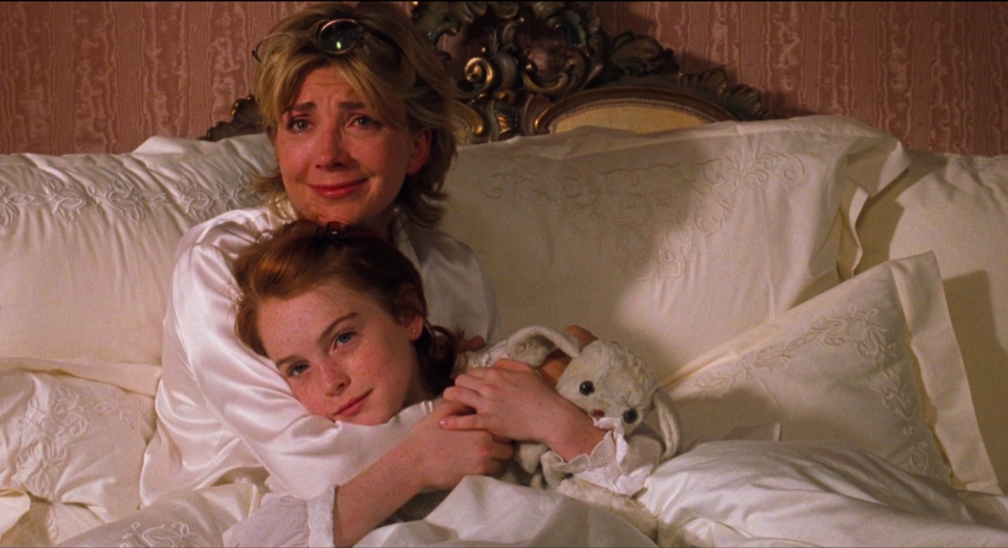 Natasha Richardson and Lindsay Lohan hugging in movie