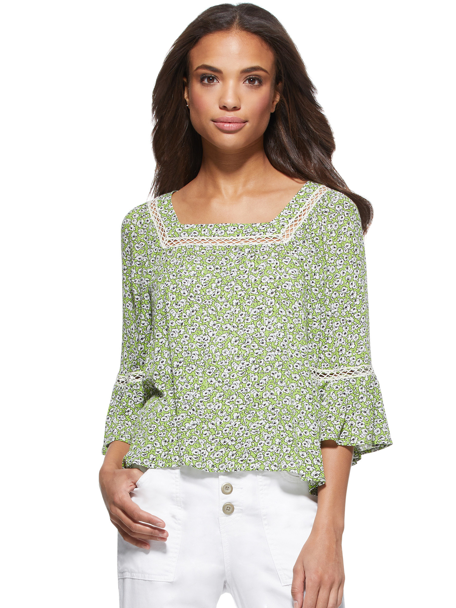 The green and white floral blouse