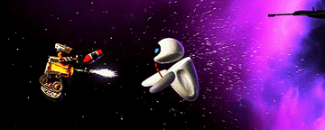 WALL-E and Eve floating through space using a fire extinguisher