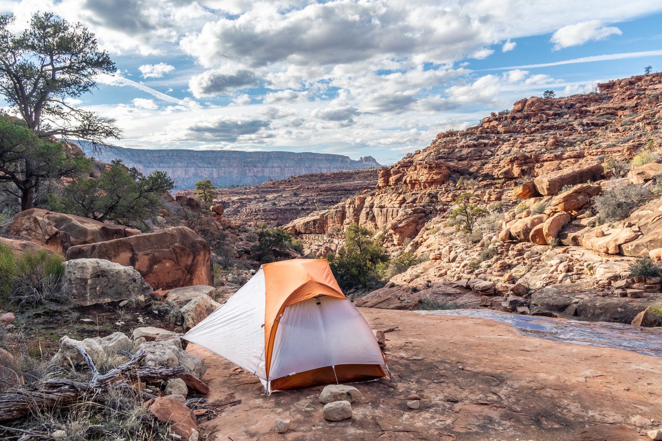 Camping on a platform of rock in the Royal Arch Drainage with running water nearby — Grand Canyon National Park, Arizona
