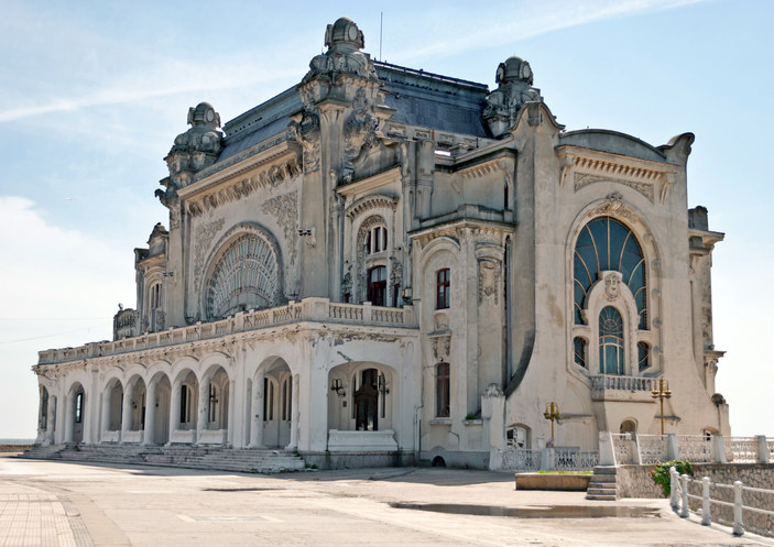 Abandoned seaside casino located in Romania, beautiful art-deco building in white stone with large glass windows