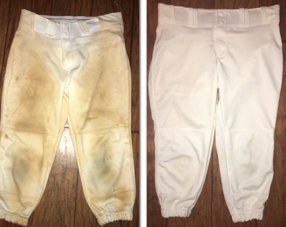 Reviewer before-and-after photos showing a pair of dirty white sweatpants completely washed clean using the soap bar
