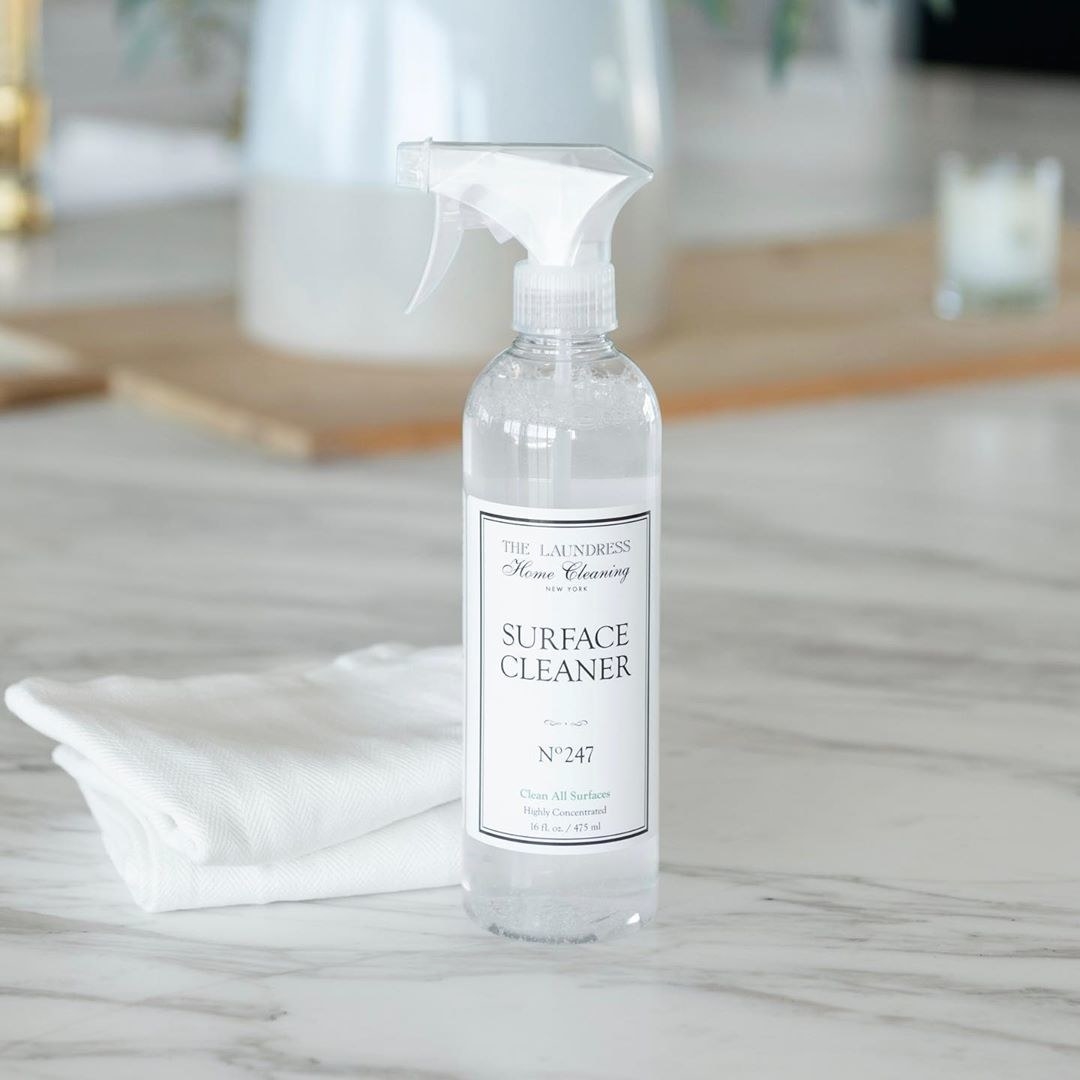 The surface cleaner, featuring sleek minimalist packaging 