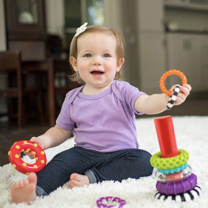 a child playing with the rings