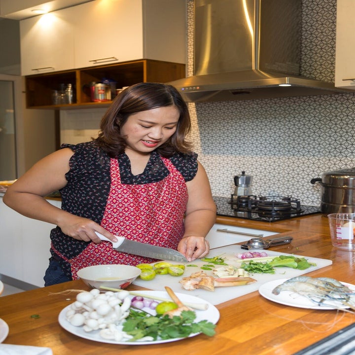 woman chopping vegetables in the kitchen