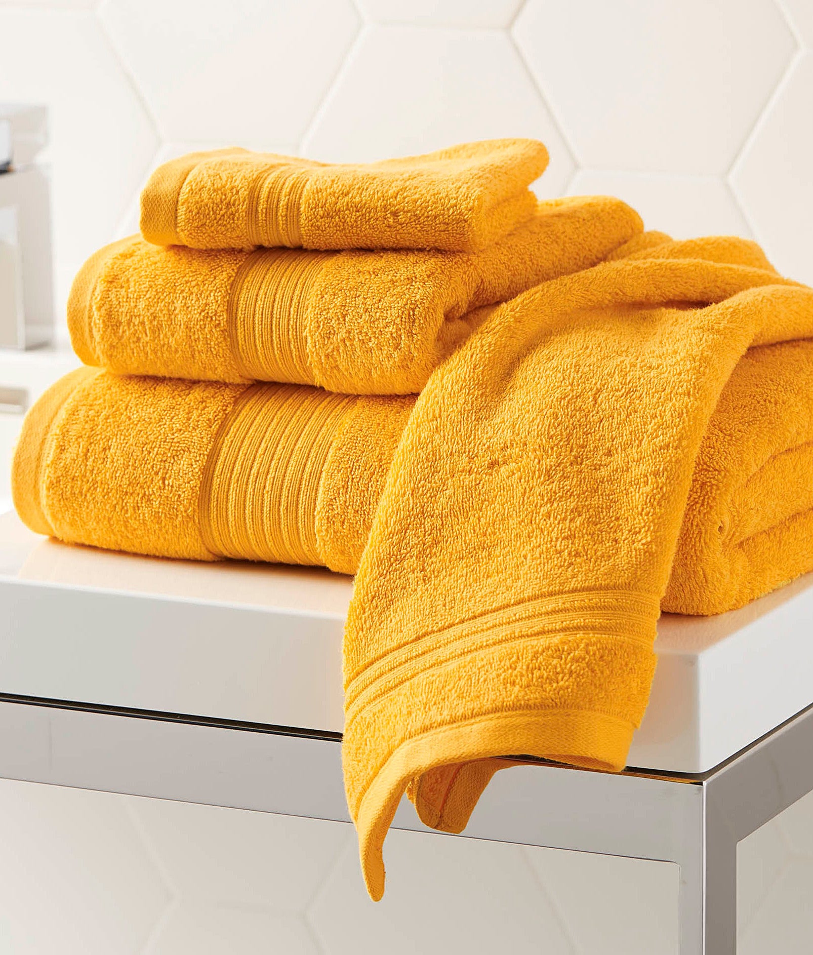 Four towels folded on top of each other