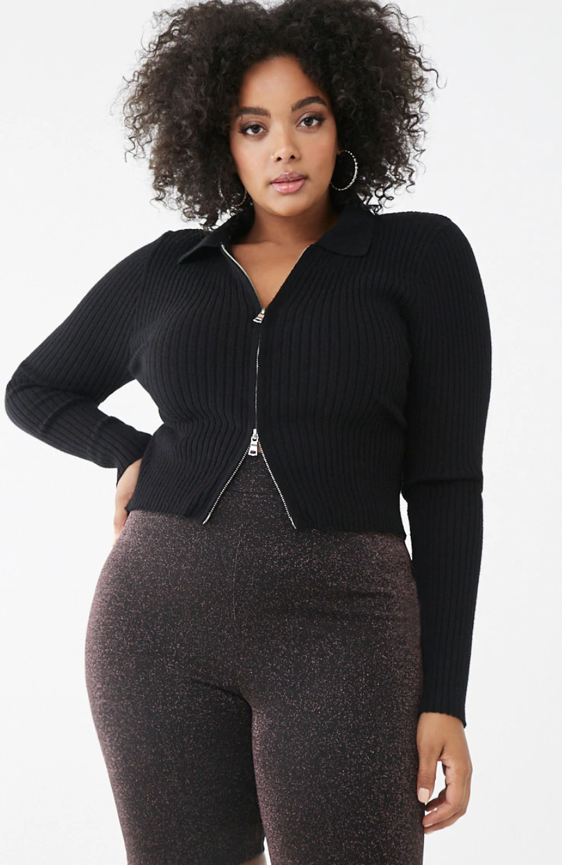 A model in rose gold metallic bike shorts 