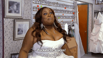 GIF of a woman saying &quot;Pockets for snacks!&quot; 