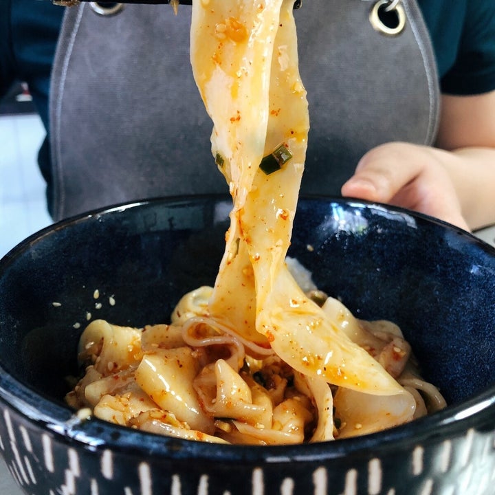 delicious-looking bowl of thick, hand-fulled noodles