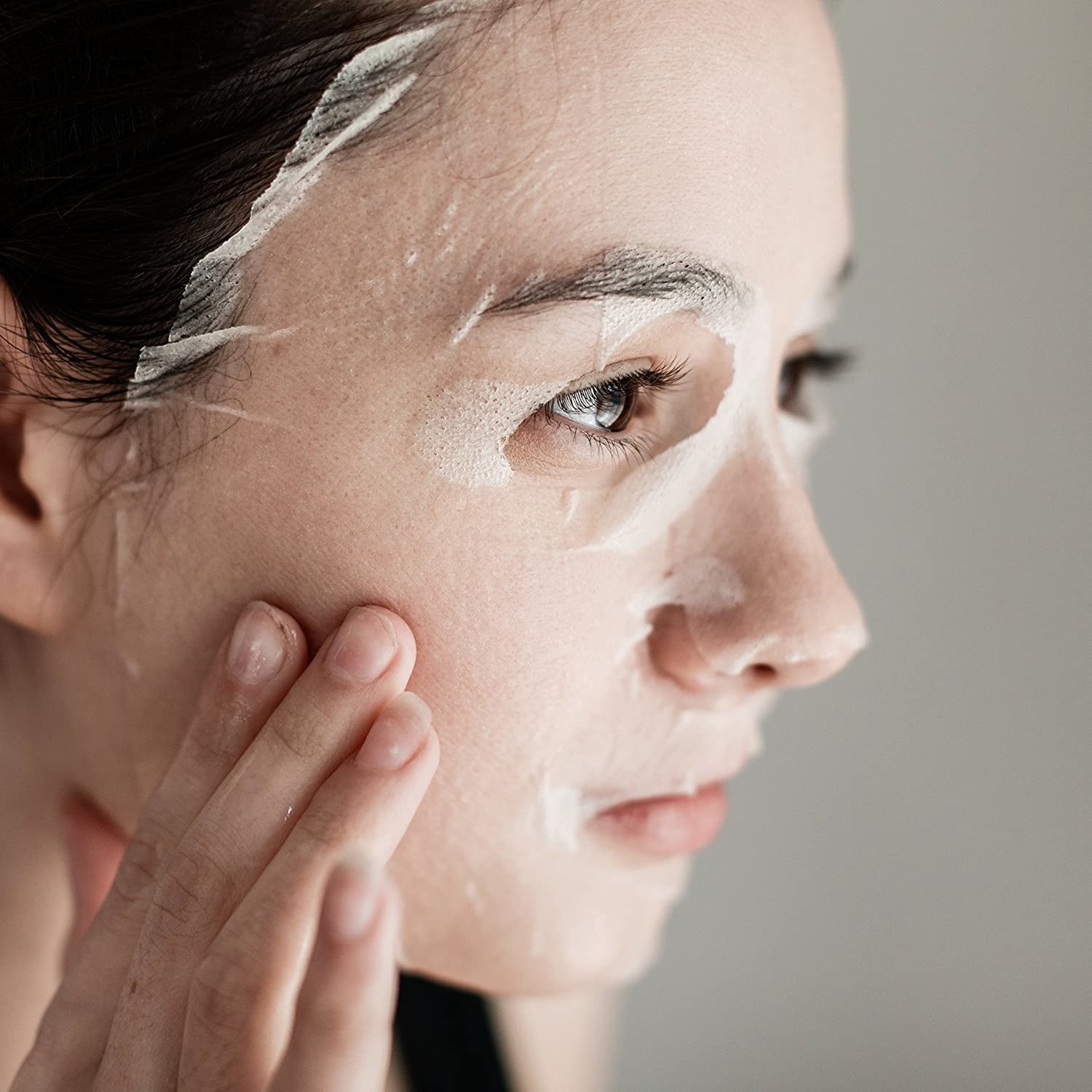 Close-up of a model wearing the sheet mask