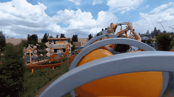 POV gif of people riding a roller coaster at Disney World.