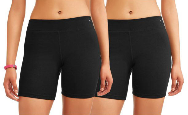Two models wearing the black cotton bike shorts