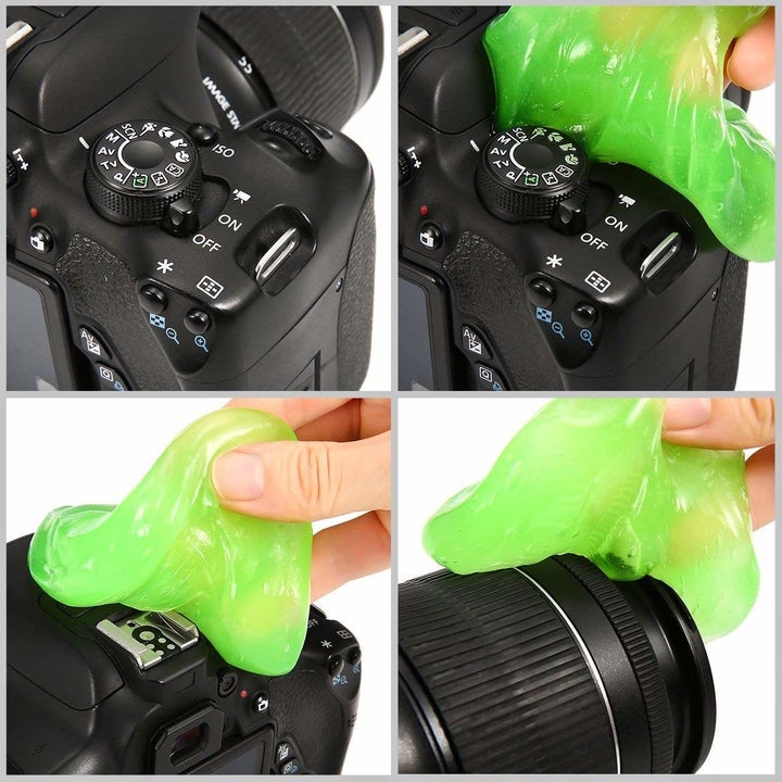 A person using the neon green goop to clean a camera.