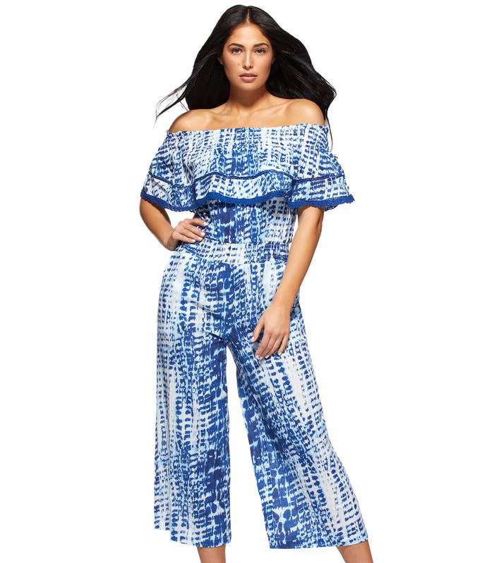 a model in the blue and white patterned jumpsuit
