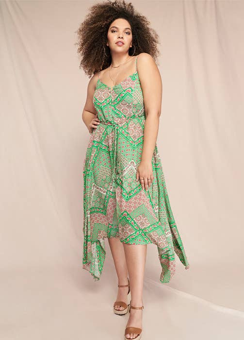 a model in a handkerchief print dress in green and pink
