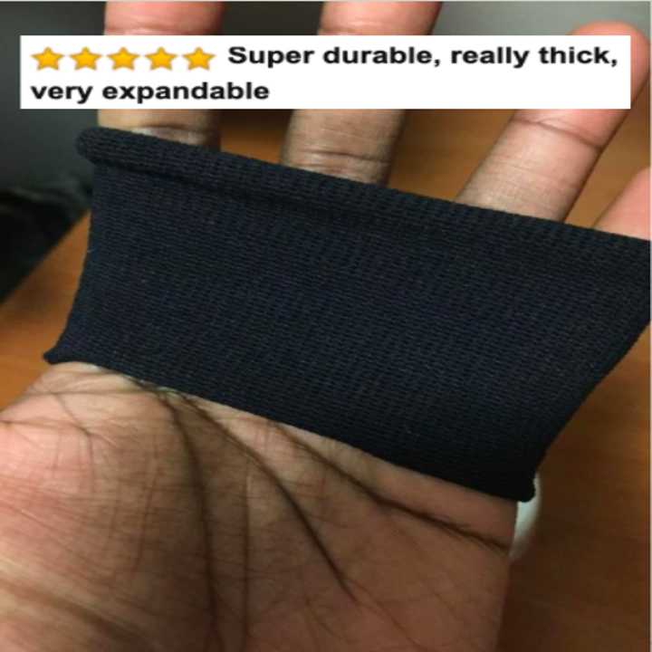 Hand stretching the thick hair tie with Amazon caption that it's super durable, really thick, and very expandable 