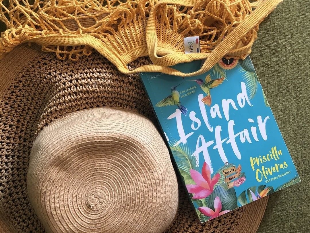 The book against a beach hat