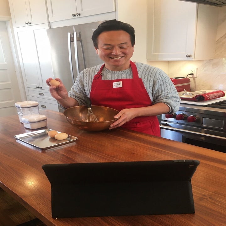 Kenji, the host, in the kitchen