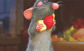 Remy from ratatouille eating a strawberry with cheese 