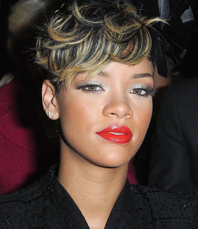Rihanna has a short hairstyle with bright highlights