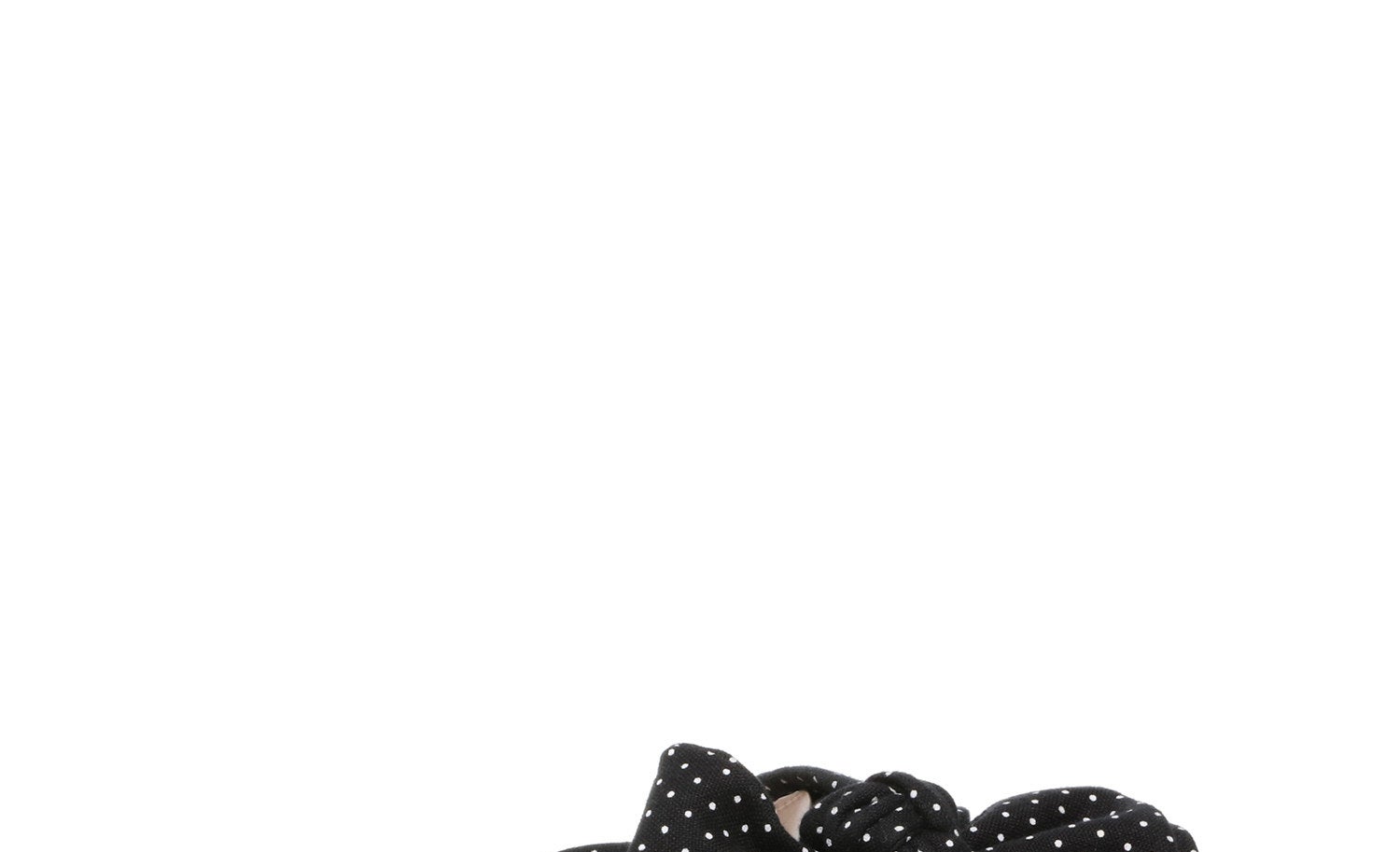 A black and white polka dot bow slide sandal 