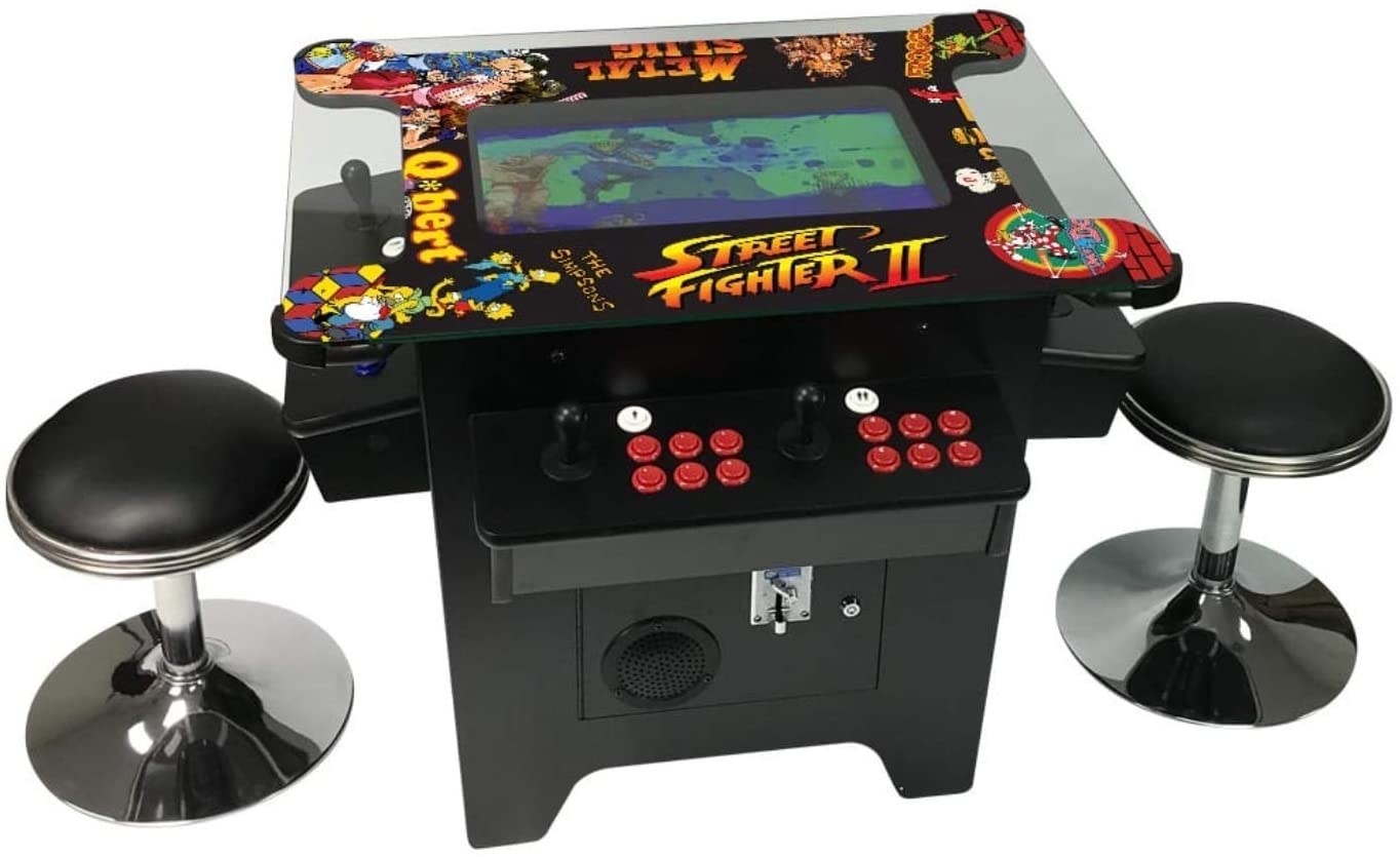 A black arcade table for Street Fighter 2 and several other games, flanked by two matching stools.  