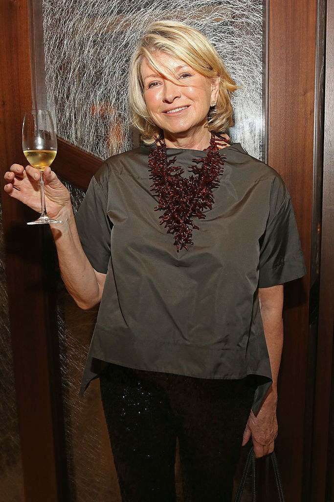 Martha Stewart raising a wine glass