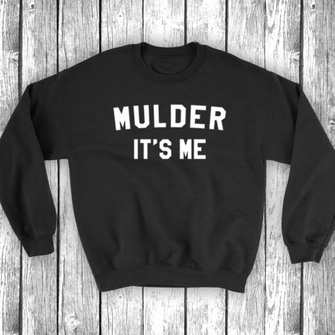 A back sweatshirt that reads, &quot;Mulder It&#x27;s Me.&quot;