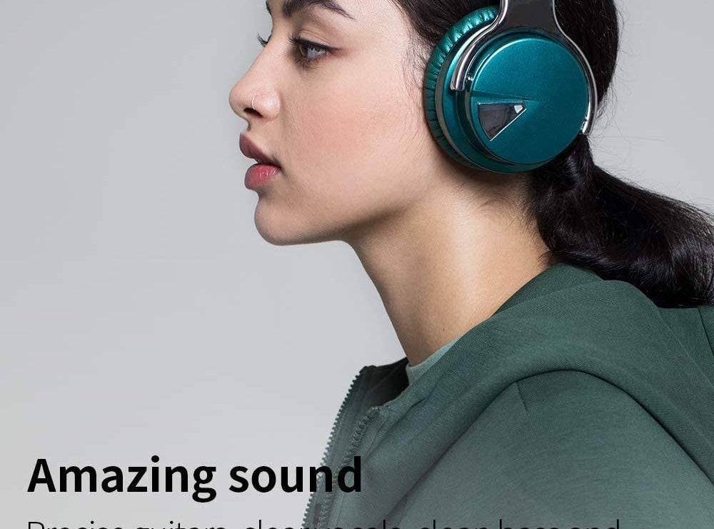 A person wears the headphones