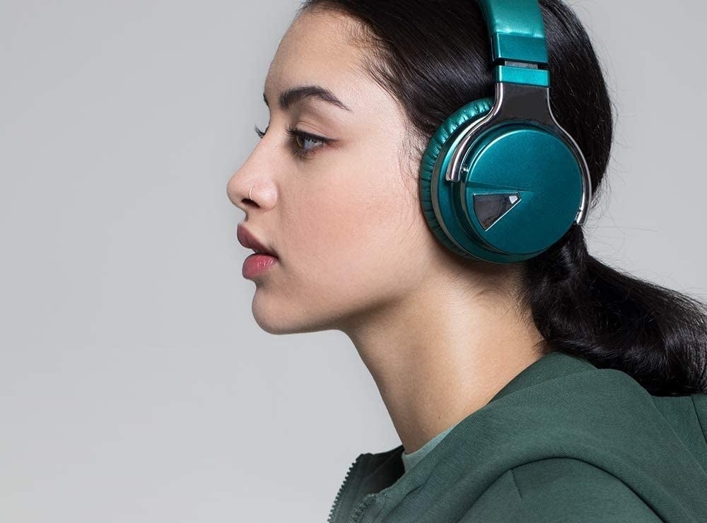 A person wears the headphones