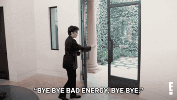 Kris Jenner opens her front door and waves her arm as she says, &quot;Bye, bye, bad energy, bye, bye&quot;