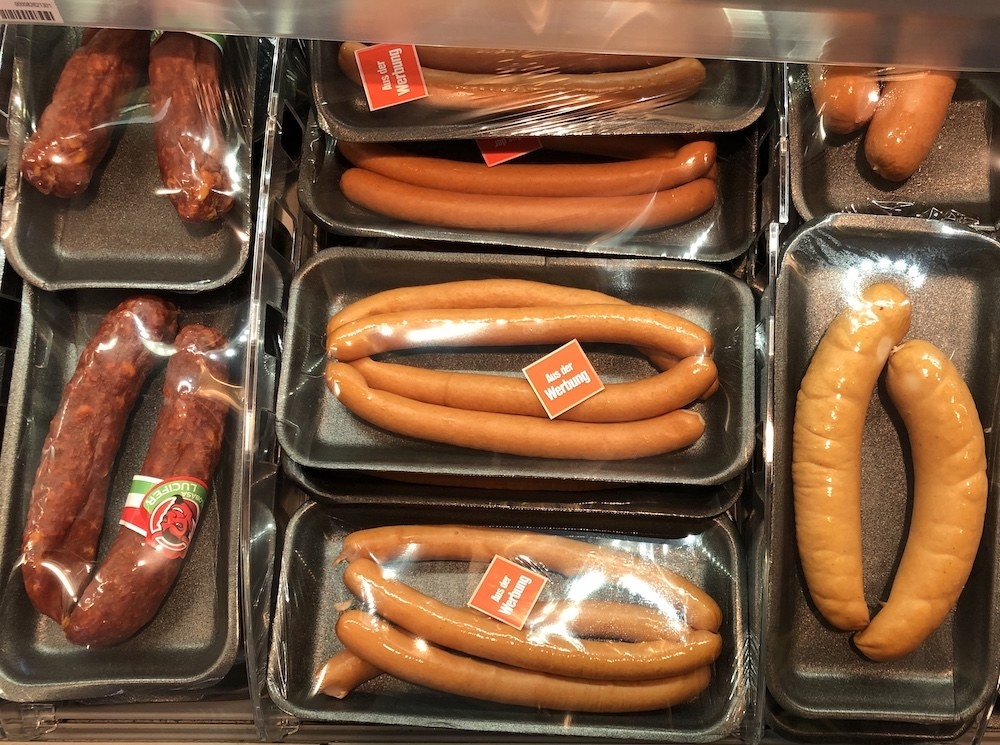 Display of packaged sausages at German supermarket