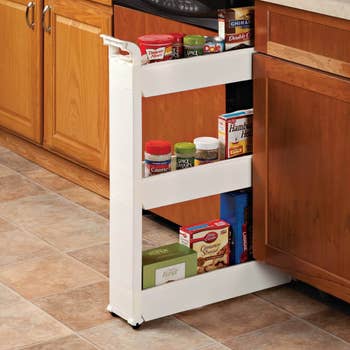 three-tier rolling cart that's slim enough to fit between an oven and kitchen cabinet