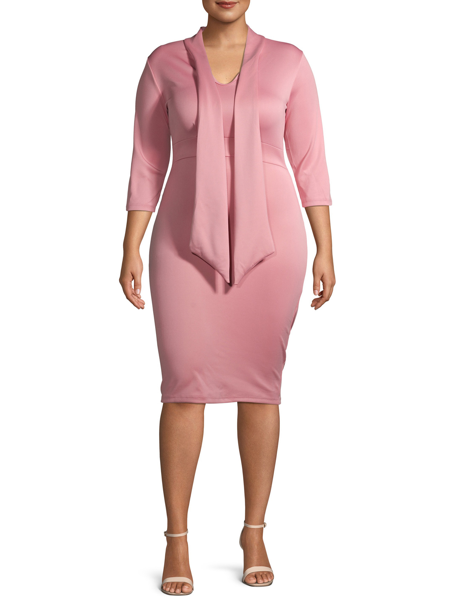 a model in the form-fitting pink dress
