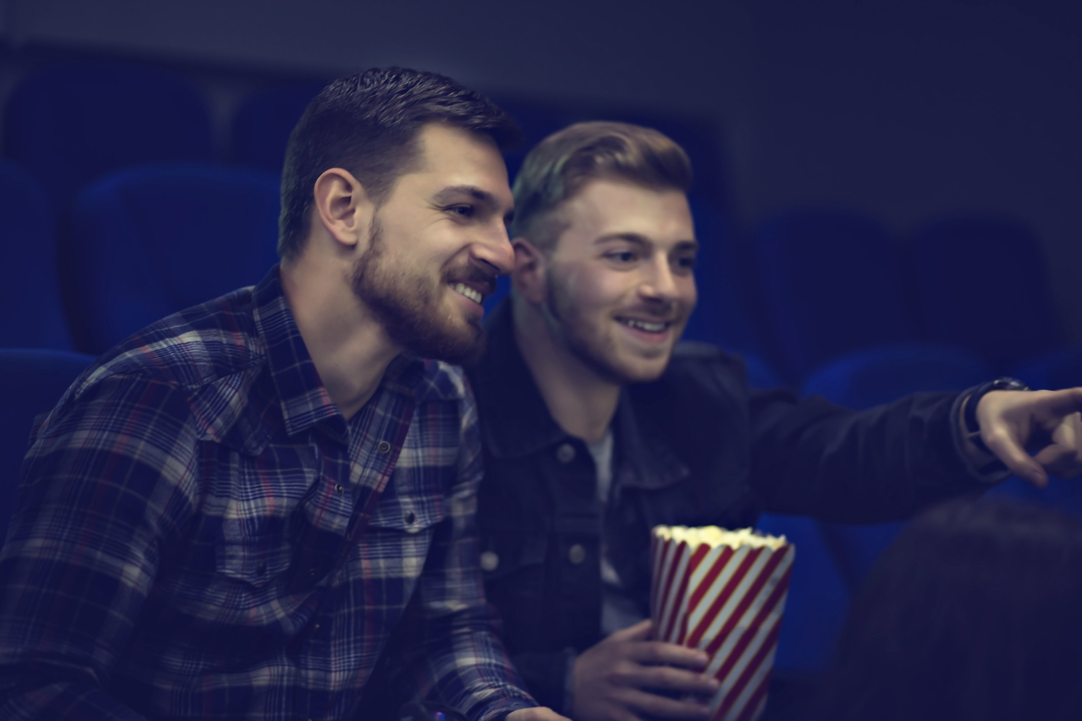 two men at a movie theater