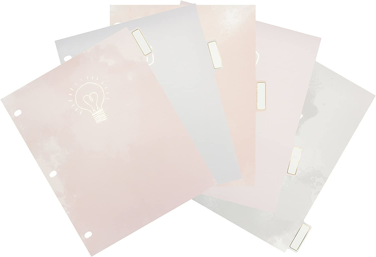 Five paper binder dividers spread out on a plain background