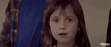 Young Mara Wilson looks amazed and mouths, &quot;Wow.&quot;