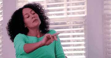 GIF of Tracee Ellis Ross putting a hand up to say &quot;no.&quot;