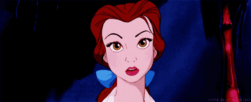 Belle from &quot;Beauty and the Beast&quot; looks into the camera, eyebrow raised in deep thought.