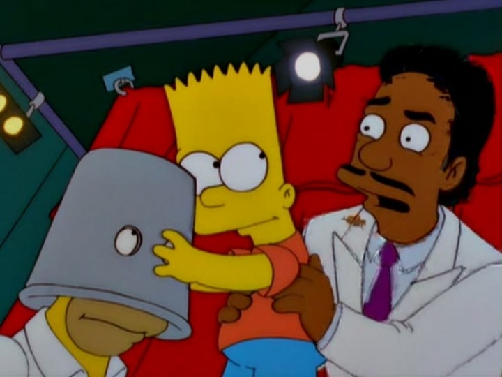 Don Cheadle&#x27;s character picking up Bart so that he can remove the bucket from Homer&#x27;s head