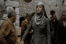 People shouting &quot;Shame&quot; in a scene from &quot;Game of Thrones&quot;