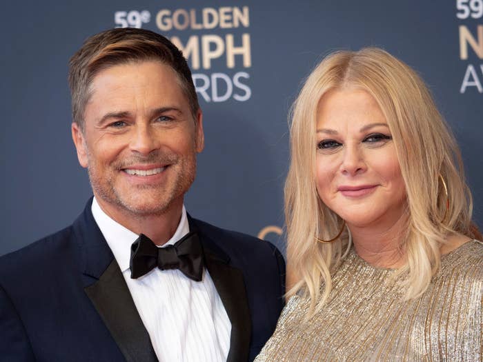 Rob and Sheryl on a red carpet