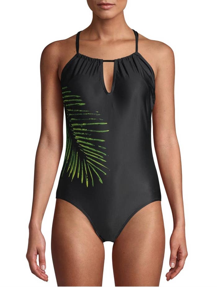 A black swimsuit with leaf detailing